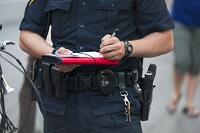 Officer writing a traffic ticket